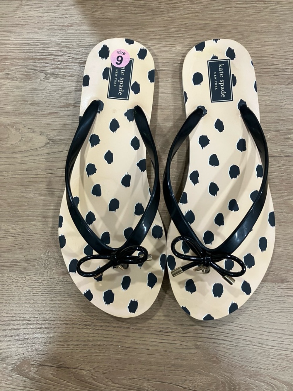 kate spade Beige Flip-Flop Sandals with Black Spot Print & Bow